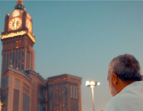 Man Looking at Clock Tower